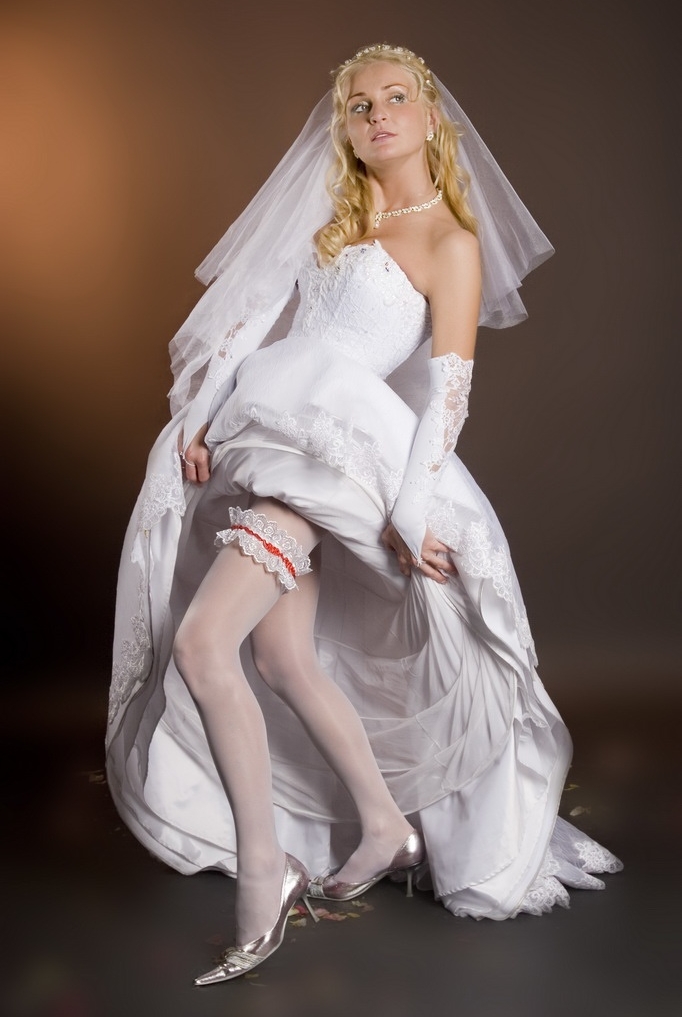 Blonde Young Bride wearing White Opaque Nylon Shiny Tights, Stilettos and White Long Dress